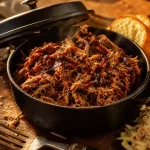Recette pulled pork au four : épaule de porc effilochée, sauce barbecue