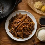 Boeuf aux oignon chinois, bœuf émincé et oignons au wok