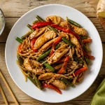 Recette émincé de poulet asiatique : émincé de poulet et sauce nappante